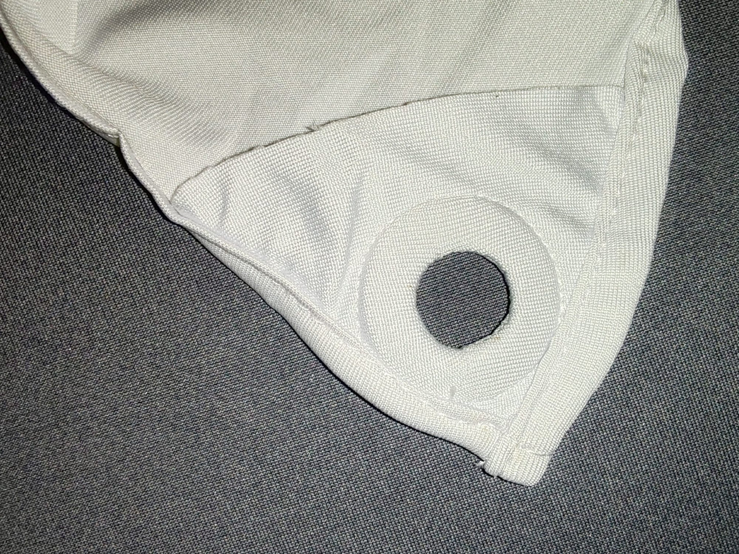 Attache oeillet toile projection lycra 